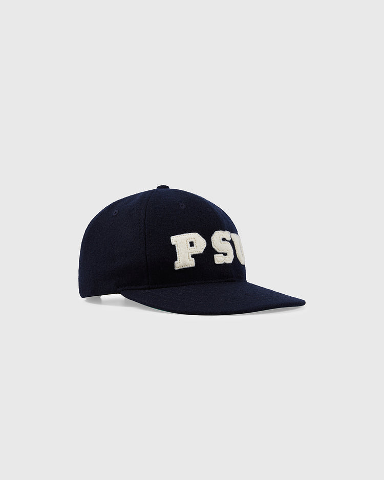 The Ebbets Field Penn State University Authentic Wool Ballcap in navy features white embroidered PSU lettering on the front and is displayed on a plain light gray background.