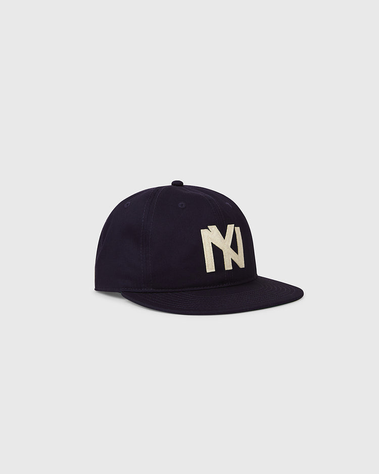 The Ebbets Field Brooklyn Eagles 1935 Cotton Twill Ballcap features a flat brim and a large white embroidered NY logo, showcased against a plain light gray background.