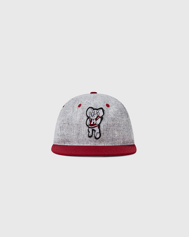 The EFF University of Alabama Mascot Vintage Ballcap is a gray wool cap with a maroon brim and button, featuring an embroidered cartoon mascot holding an H on the front for a playful, retro college look.