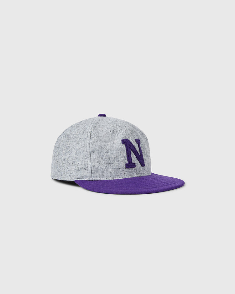 The EFF Northwestern University 1917 Vintage Ballcap features a gray design with a purple brim and large purple N on the front, officially licensed as a college vault piece and shown on a plain light background.