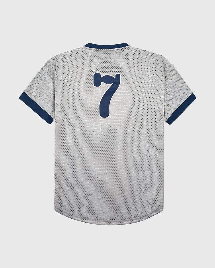 The Ebbets Field Osaka Tigers Mesh V-Neck Jersey features gray mesh fabric with a navy collar and cuffs, plus a bold navy number 7 on the back—echoing classic Japanese baseball style from historic Koshien Field.