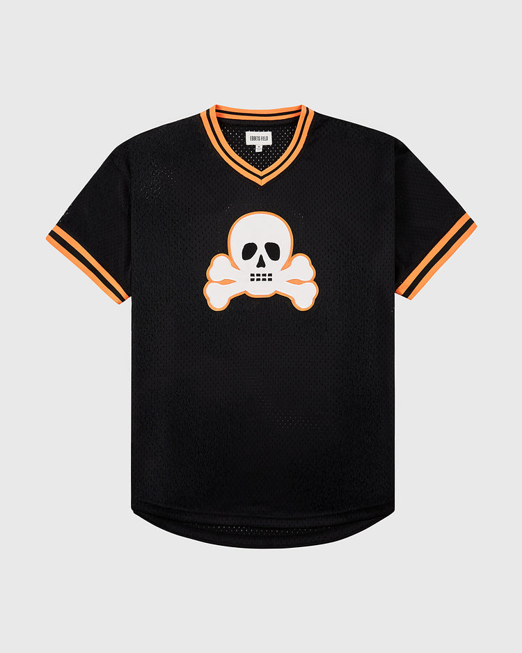 The Ebbets Field Sioux City Ghosts Mesh V-Neck Jersey is a black short-sleeve mesh top with orange and white trim, featuring a bold white skull and crossbones graphic outlined in orange, inspired by the legendary softball team.