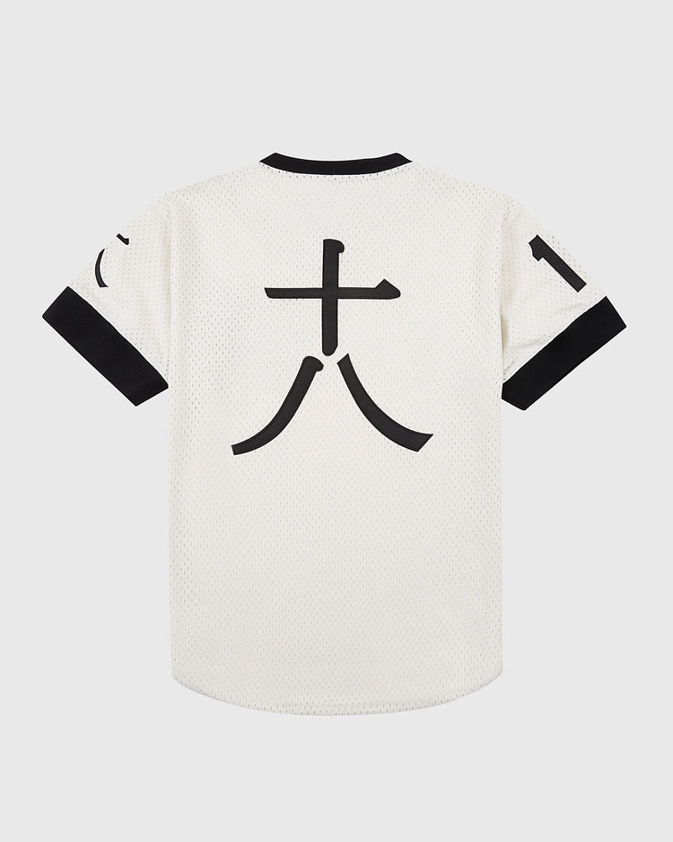 The Ebbets Field Tokyo Giants Mesh V-Neck Jersey is a white short-sleeve jersey with black collar and sleeve cuffs, featuring a bold black kanji on the back and number 17 on the left sleeve to honor Victor Starffin.