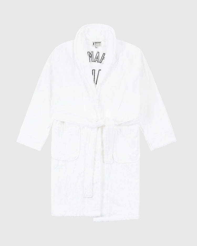 The Ebbets Field Muhammad Ali Cotton Terry Boxing Robe features long sleeves, a shawl collar, front pockets, and a fabric belt at the waist, taking inspiration from classic boxing robes. Shown against a plain light gray background.
