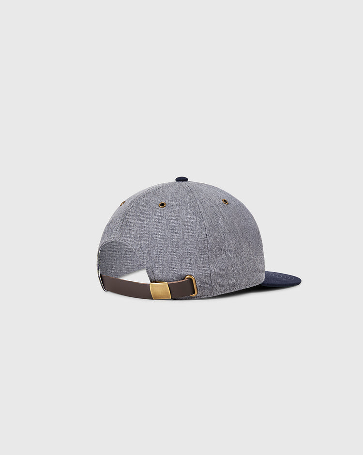 The Ebbets Field Hiroshima Carp Cotton Twill Ballcap is shown from the back in gray with a dark blue brim, adjustable brown strap, and brass buckle on a light gray background—ideal for any Hiroshima Carp fan.