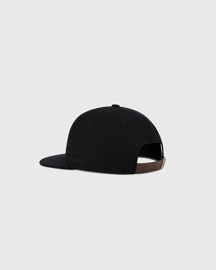 The Ebbets Field Chicago White Sox 1959 MLB Authentic Wool Ballcap, part of the Decade of Change Collection, is black with a curved brim and features an adjustable brown strap with a metallic buckle, inspired by the original 1959 design.