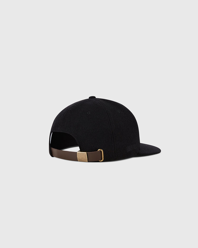 The Ebbets Field Chicago White Sox 1959 MLB Authentic Wool Ballcap is shown from the back, featuring a black crown, brown adjustable strap with gold buckle, and set against a light gray background. Part of the Decade of Change Collection.