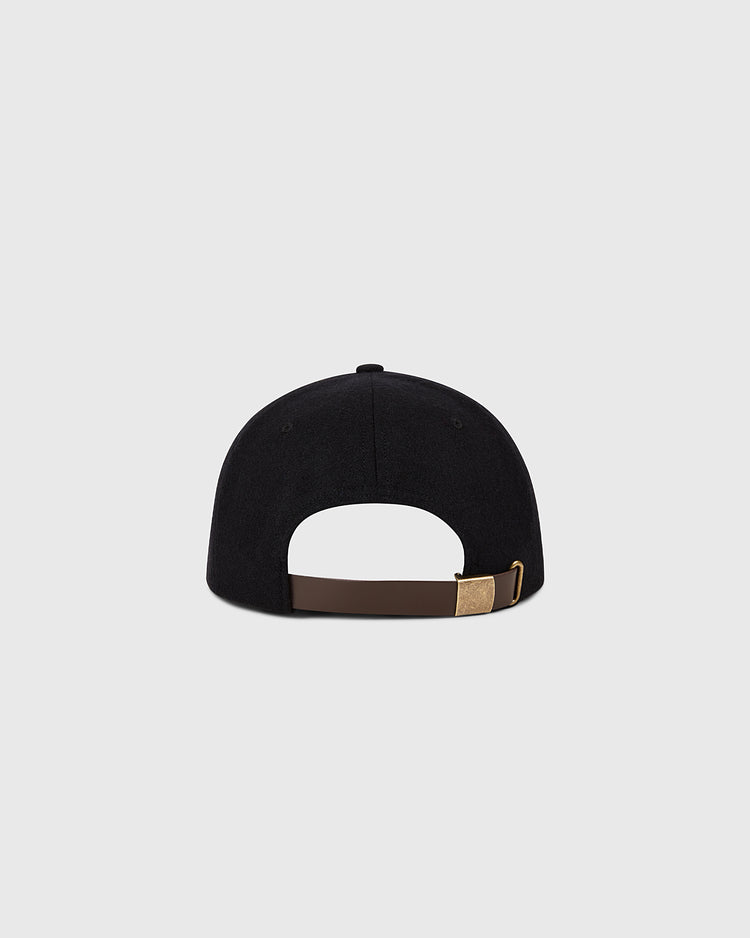 The Ebbets Field Baltimore Orioles 1954 MLB Authentic Wool Ballcap, shown from the back, features a brown adjustable strap with a brass clasp. Inspired by classic on-field caps from the Decade of Change Collection. Plain light gray background.