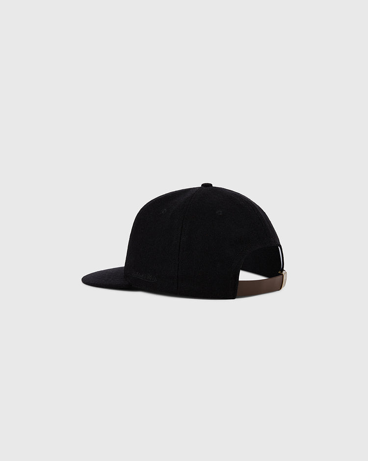 The Ebbets Field Pittsburgh Pirates 1960 MLB Authentic Wool Ballcap is shown from the back on a light gray background, featuring a brown adjustable strap with a metal buckle.