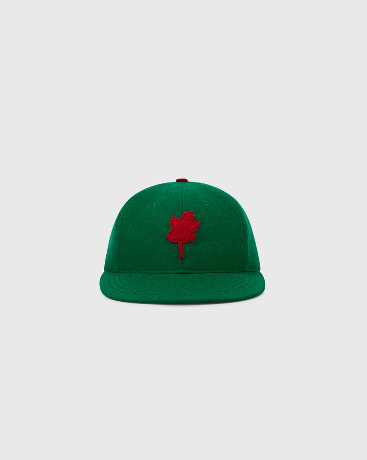 The EFF Oakland Oaks 1939 Authentic Wool Ballcap features a green design with a red maple leaf emblem, inspired by the Pacific Coast League team, and is displayed on a plain light gray background.