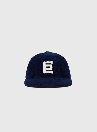 The Tokyo Giants Japanese Indigo Corduroy Ballcap by Ebbets Field features navy blue Japanese indigo-dyed corduroy and a bold white