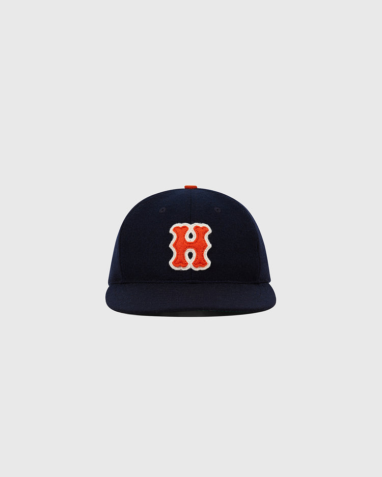 The Ebbets Field Hiroshima Carp 1958 Authentic Wool Ballcap is a navy cap with a flat brim and bold red-and-white