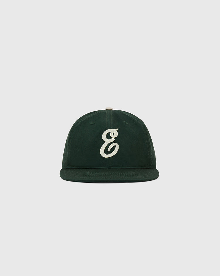 The Ebbets Field Ebbets Felt 'E' Cotton Twill Ballcap features a dark green cotton twill build and a white, stylized 'e' on the front, shown on a light gray background—ideal for everyday wear.