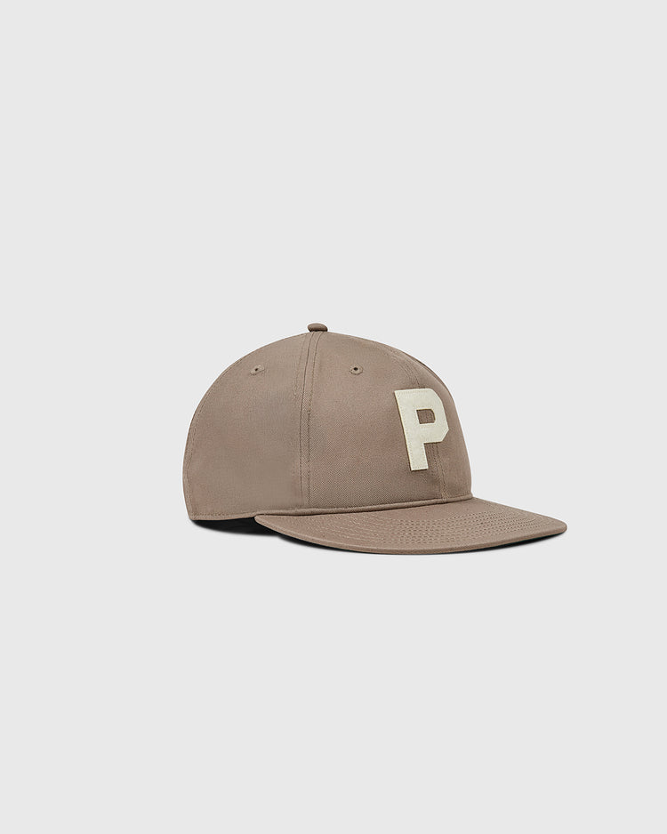 The Ebbets Field Paris Red Peppers Cotton Twill Ballcap features taupe cotton twill, a flat brim, and a bold white