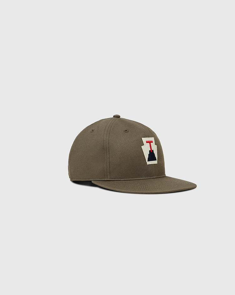 The Ebbets Field Tabasco Plataneros Cotton Twill Ballcap is a brown flat-brim hat with a front rectangular patch in red, black, and white, shown on a light gray background—perfect for Plataneros Tabasco or Mexican League fans.