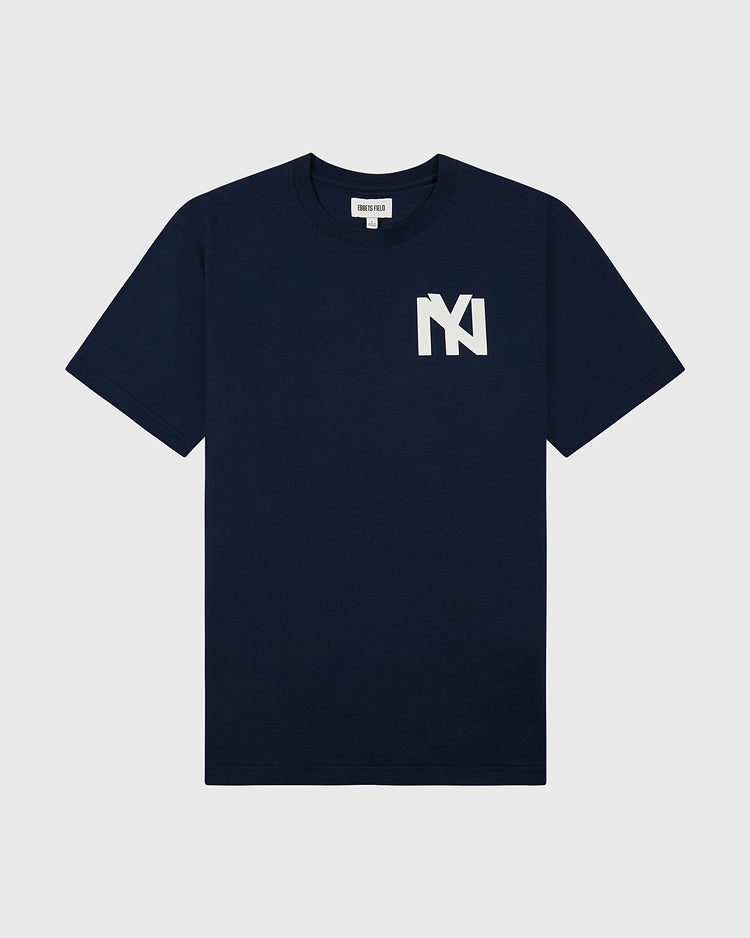 The Ebbets Field Brooklyn Eagles Logo Short Sleeve Tee Shirt in navy features a bold vintage team logo on the left chest, displayed against a plain light gray background.