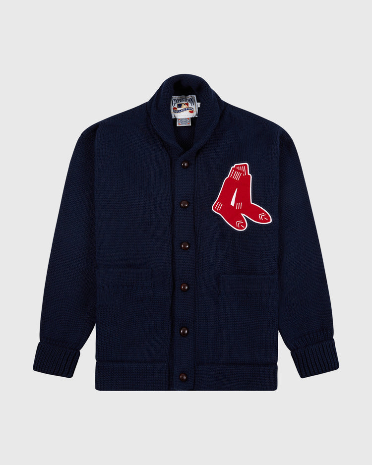 The EFF Boston Red Sox 1924-1960 Wool Shawl Collar Sweater is a navy cardigan with front pockets, a shawl collar, and a large red hanging socks logo patch on the left chest.