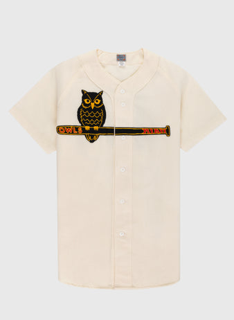 The EFF Topeka Owls 1947 Authentic Wool Home Baseball Jersey is cream-colored with a front button closure and features an embroidered owl on a bat with