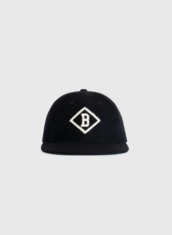 The EFF Bismarck Churchills 1935 Authentic Wool Softbrim Ballcap features a black design with a white diamond B emblem, inspired by the legendary 1935 team, shown against a plain light gray background.