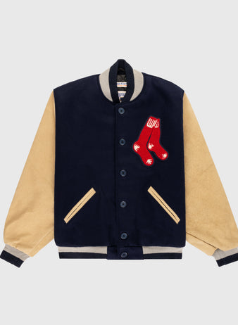 The EFF Boston Red Sox 1938 Authentic Wool & Suede Leather Varsity Jacket features a navy body, beige suede sleeves, front pockets, and a red crossed socks patch on the chest for an authentic baseball look.