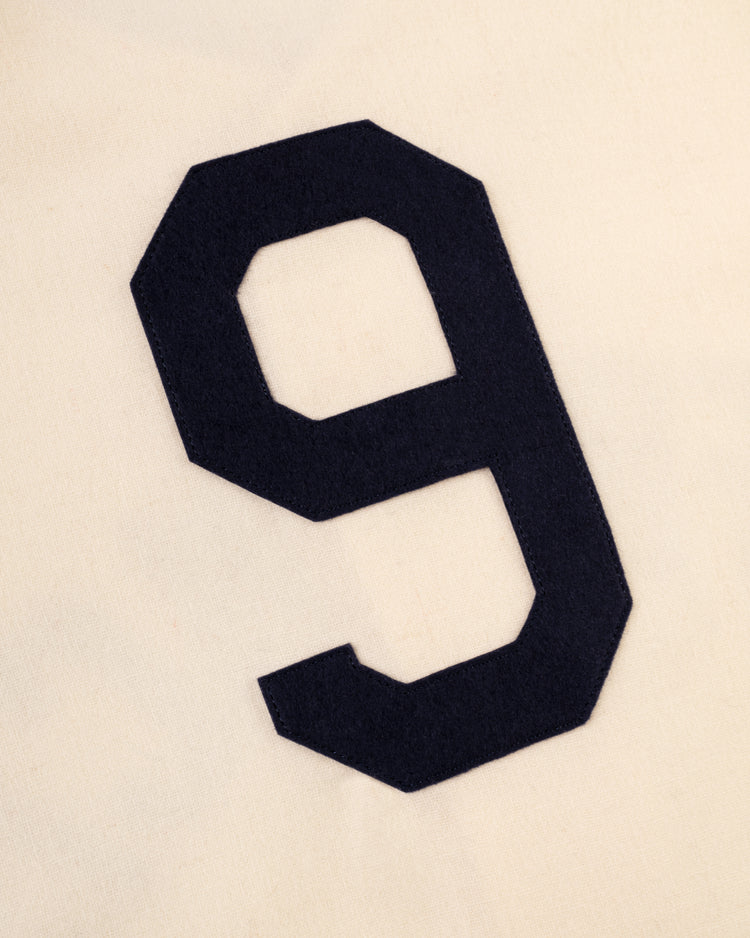 A large black number 9 is sewn onto a light beige fabric background on the EFF San Francisco Sea Lions 1946 Authentic Wool Home Jersey, inspired by the historic Negro leagues team.