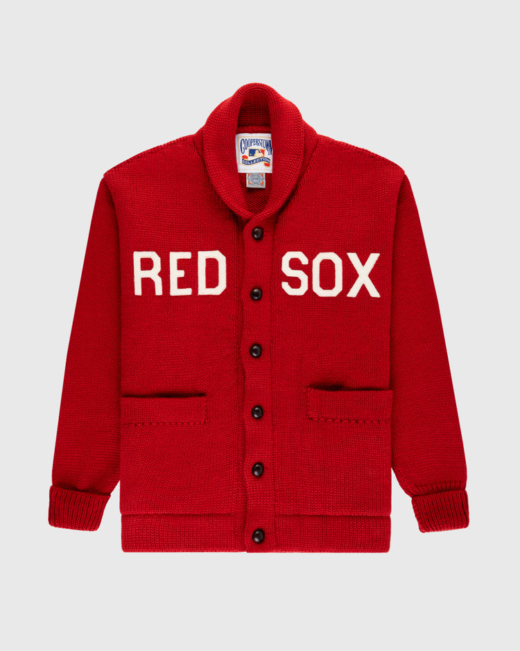 The EFF Boston Red Sox 1917 Wool Shawl Collar Sweater features red knit wool, black buttons, two front pockets, “RED SOX” in white across the chest, and a vintage-style collar tag inspired by the Dead Ball Era.