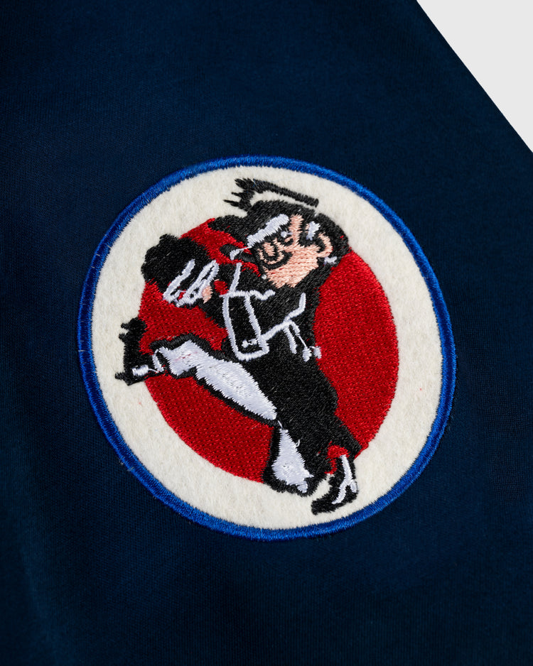 Embroidered patch of a cartoon martial artist in black and white, high kicking on a red and white circle—ideal for customizing your EFF Boston Red Sox 1967 Satin Windbreaker Jacket.