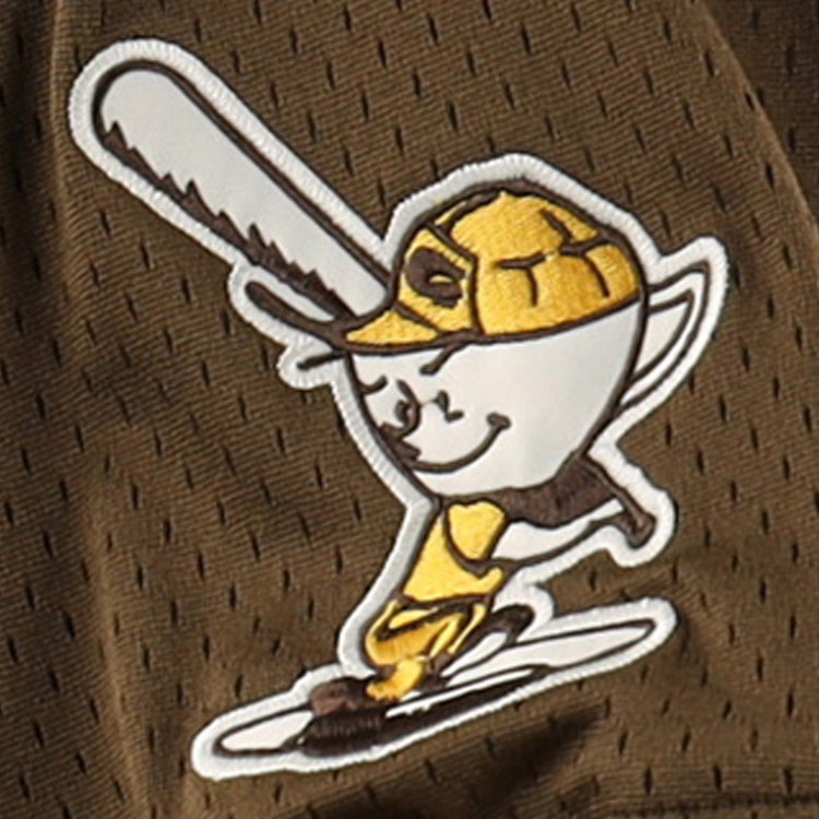 A cartoon egg in a yellow Cordoba Cafeteros cap and EFF uniform swings a big bat, smiling, on the Cordoba Cafeteros EFF DNA Replica V-Neck Mesh Jersey—a fun tribute to Mexican baseball history, with stick limbs adding playful charm.