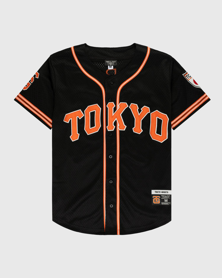 The EFF Tokyo Giants Mesh Button-Up Jersey is a vintage-inspired black mesh jersey with orange and white trim, bold orange TOKYO lettering on the front, and Tokyo Giants patches on the sleeves and hem.