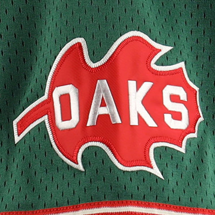 The Oakland Oaks EFF DNA Replica Button-Up Mesh Jersey by EFF features Pacific Coast League-inspired green mesh and a red oak leaf patch with âOAKSâ in bold white letters across the center.