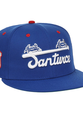 The EFF Santurce Cangrejeros NLB Team Color Fitted Ballcap is a vintage-inspired blue hat with Santurce in white under two blue and white crab logos, plus a Puerto Rican League red and white side patch and red accents on the top and eyelets.