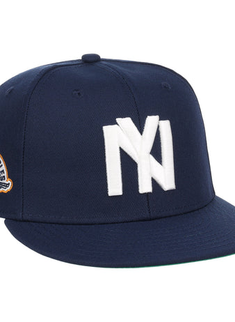 The EFF Brooklyn Eagles NLB Team Color Fitted Ballcap is a navy blue cap with a bold white NY logo on the front and a side eagle patch displaying 1993 and BKLYN EAGLES.