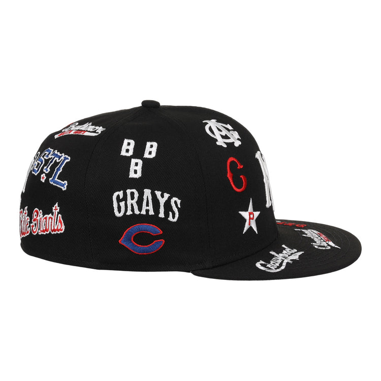The EFF Negro League Baseball NLB Team Color Fitted Ballcap is a vintage-inspired black cap featuring embroidered white, red, and blue team logos and names on the front, side, and brim.