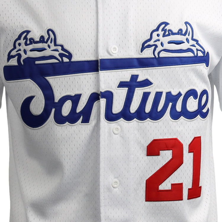 A close-up of the EFF Roberto Clemente Santurce Cangrejeros Vintage Inspired NL Replica Button-Up Mesh Jersey: white with blue Santurce script, blue crab graphics, and red 21 on the right side.