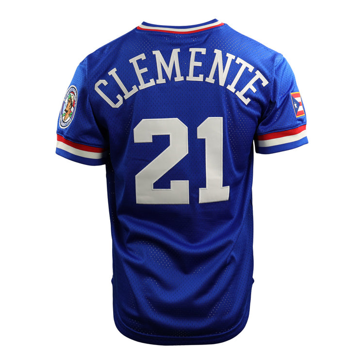 The EFF Roberto Clemente Santurce Cangrejeros Vintage Inspired NL Replica V-Neck Mesh Jersey in royal features white Clemente 21 on the back, a right sleeve patch, and a Puerto Rican flag patch on the left sleeve.