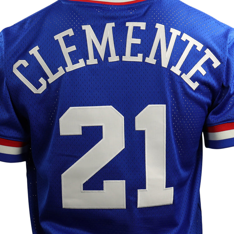 The back of the EFF Roberto Clemente Santurce Cangrejeros Vintage Inspired NL Replica V-Neck Mesh Jersey in royal shows CLEMENTE and 21 in white, plus red, white, and blue sleeve trim for a classic look.