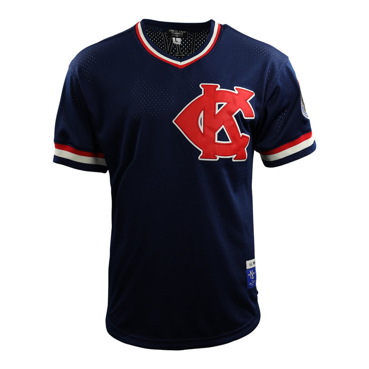 The EFF Jackie Robinson Kansas City Monarchs Vintage Inspired NL Replica V-Neck Mesh Jersey features navy blue mesh, red and white trim, a large interlocking KC chest logo, and left sleeve patch, inspired by classic Ebbets Field Flannels.