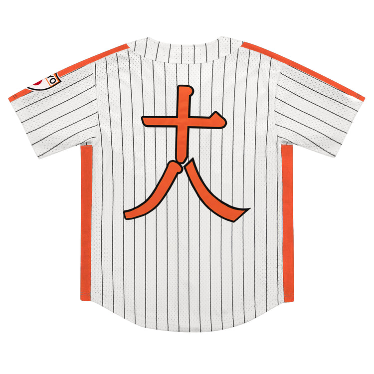 The EFF Tokyo Giants Pinstripe Button Down Jersey features white fabric with black stripes, orange side panels, and a bold orange kanji character 大 (great) on the back, inspired by iconic Tokyo Giants style.