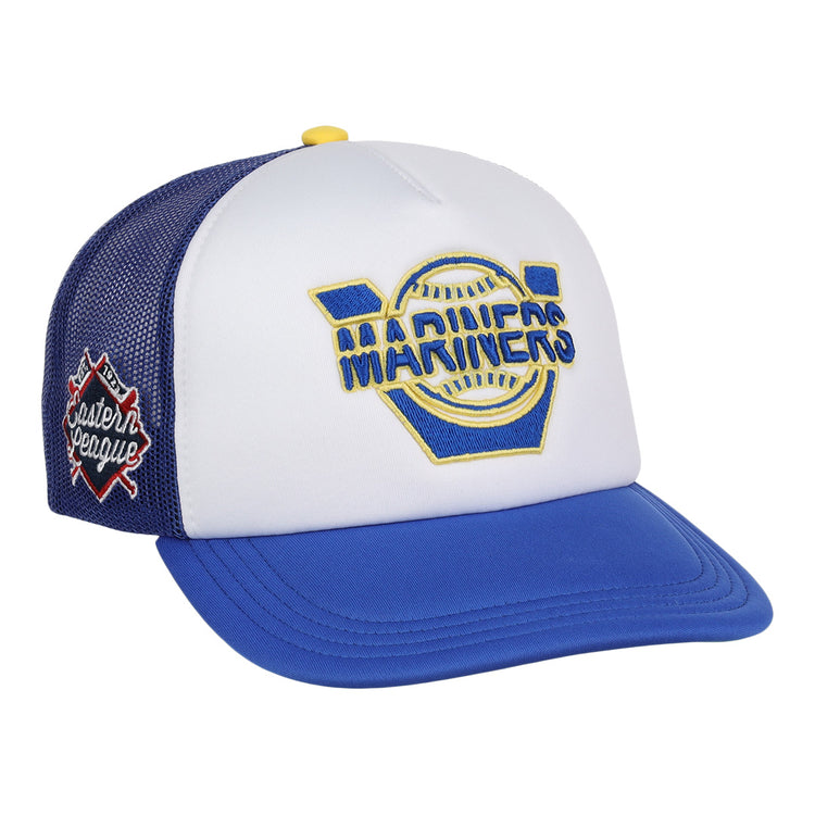 The EFF Vermont Mariners EFF MiLB Vintage Foam Trucker is a white and blue snapback with a yellow and blue Mariners logo, red Eastern League patch, mesh back, and blue bill—ideal for collectors of the Vintage Minor League collection.