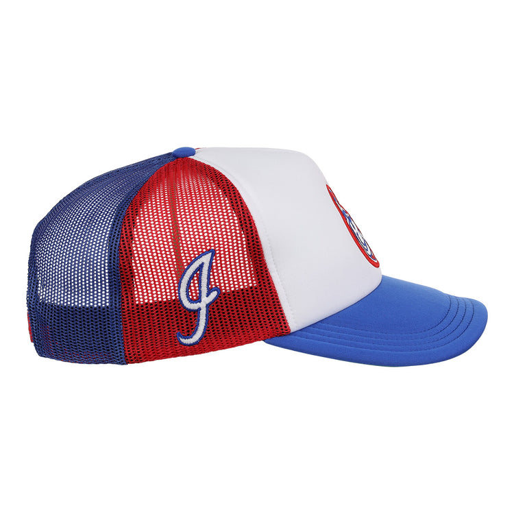 A side view of the EFF Indianapolis Indians EFF MiLB Vintage Foam Trucker snapback hat in blue, red, and white, featuring a blue mesh back, white front panel, red side, blue J embroidery, blue brim, and a circular front logo.