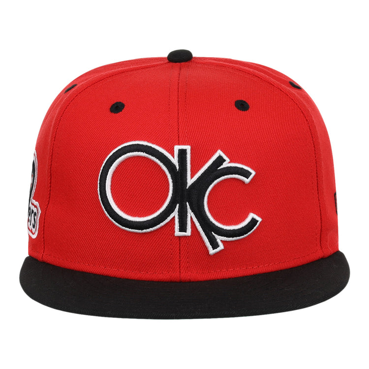The Ebbets Field Flannels Oklahoma City 89ers EFF MiLB Vintage Snapback features a red cap, black brim, bold white and black OKC embroidery on the front, and an adjustable snapback closure.