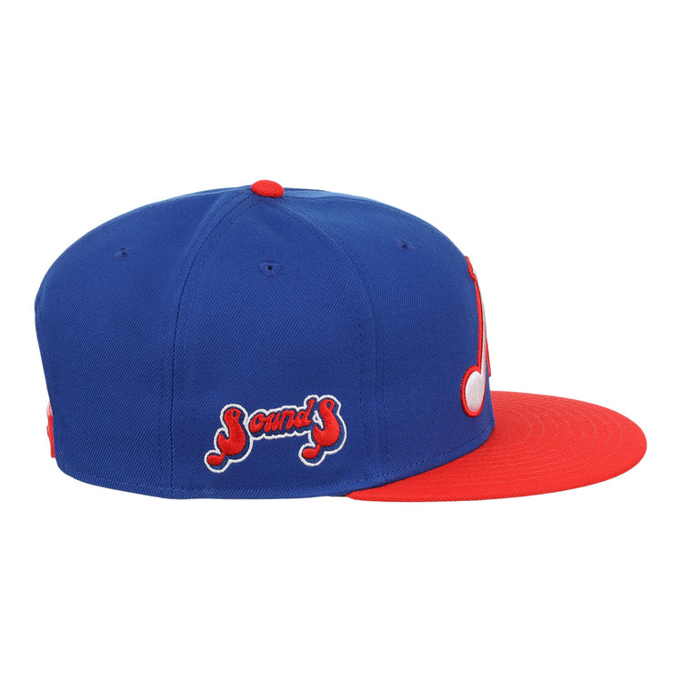 The Nashville Sounds EFF MiLB Vintage Snapback by Ebbets Field Flannels features a blue crown, red brim and button, white musical note front patch, bold 3D âNâ logo, and âSoundsâ in red/white script on the side.