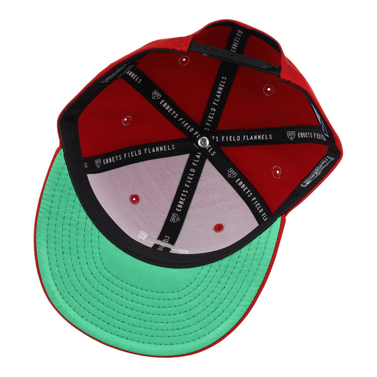 Inside view of the Ebbets Field Flannels Chattanooga Lookouts EFF MiLB Vintage Snapback shows black lining with âEBBETS FIELD FLANNELSâ text, white stitching, green underbill, and an adjustable snapback closure.