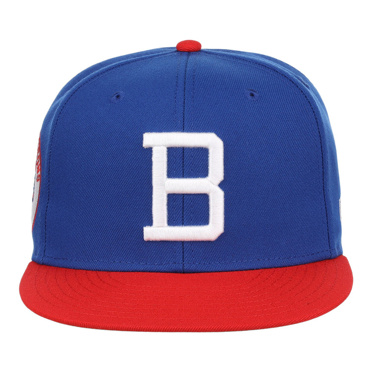 The Buffalo Bisons EFF MiLB Vintage Snapback by Ebbets Field Flannels features a blue crown, red brim, large white B front, and an adjustable snapback. Part of the Vintage Minor League collection.