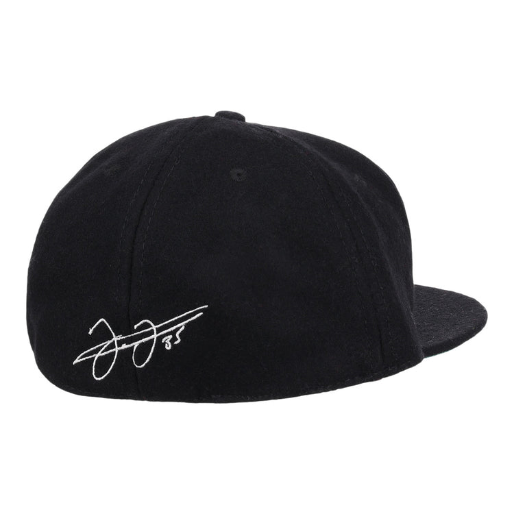The Frank Thomas Signature Series Ballcap by Ebbets Field Flannels is a black vintage wool cap, seen from the back, with a white Frank Thomas signature and the number 85 on the left side above the brim.