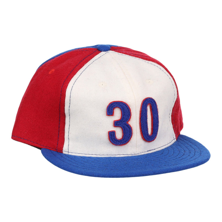 The Tim Raines Signature Series Ballcap by Ebbets Field Flannels is a vintage wool cap in red, white, and blue with 30 on the front and a blue brim—classic style perfect for National Baseball Hall of Fame fans.