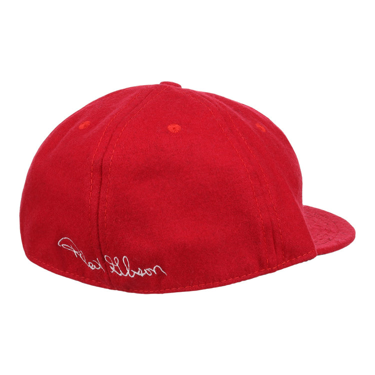 The Bob Gibson Signature Series Ballcap by Ebbets Field Flannels is a bright red vintage wool cap with white cursive embroidery near the adjustable strap, shown from the side and back against a white background.