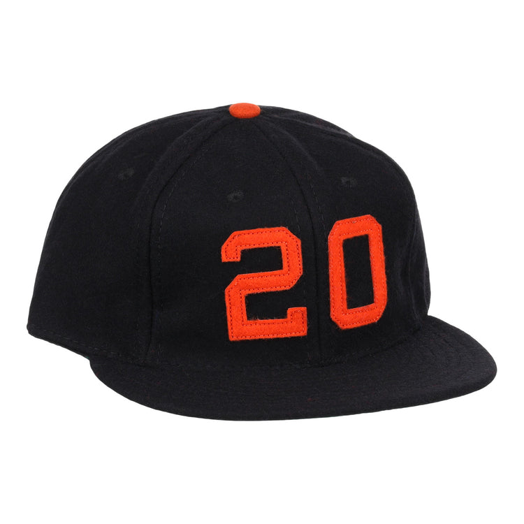The Monte Irvin Signature Series Ballcap by Ebbets Field Flannels is a black vintage wool cap with an orange top button and bold orange number 20 on the front, honoring Monte Irvin of the Negro National League.