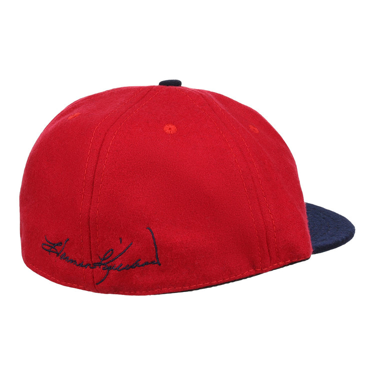 The Ebbets Field Flannels Harmon Killebrew Signature Series Ballcap features red vintage wool, a dark blue brim, and a black embroidered signature above the brim—perfect for National Baseball Hall of Fame fans. Plain white background.