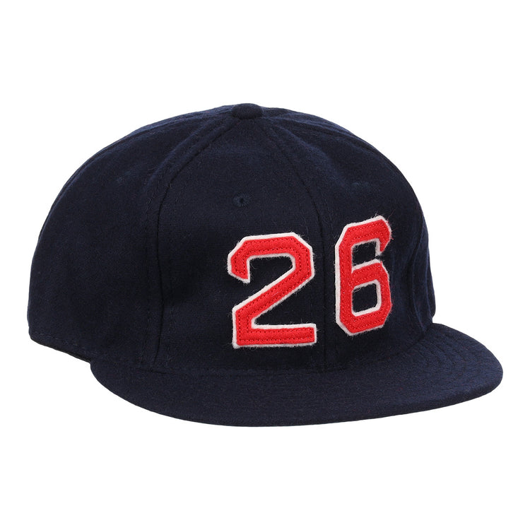 The Ebbets Field Flannels Wade Boggs Signature Series Ballcap is a dark blue vintage wool cap with a red and white number 26 on the front, inspired by classic styles from the National Baseball Hall of Fame.